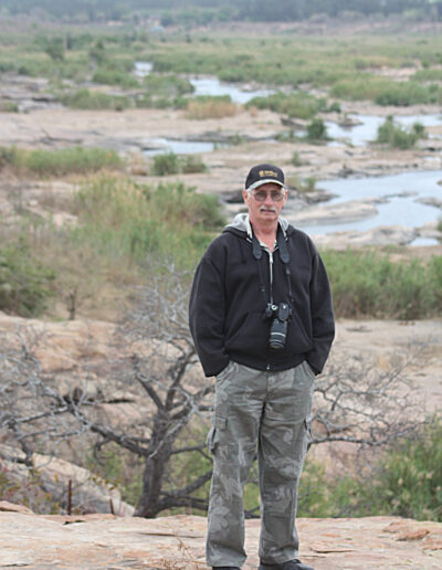 Long time friend and great travel companion, Lew Carter of Williams, Iowa. He is on high alert for "critters" deep in the heart of the Kruger.